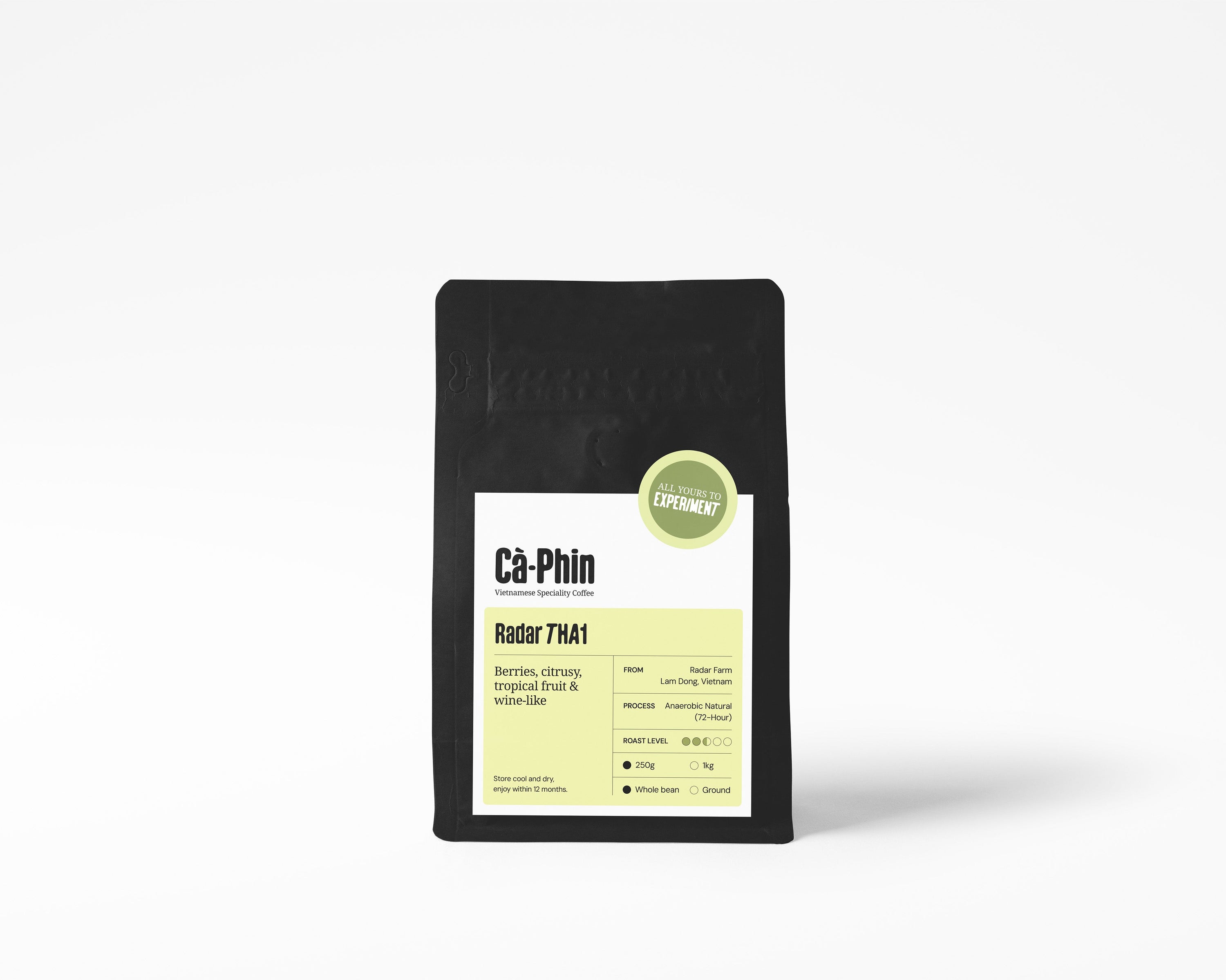 A matte black coffee bag with a white and light green label, standing upright on a clean white background. Reads: 'Ca Phin Vietnamese Speciality Coffee', 'Radar THA1', 'All yours to experiment'